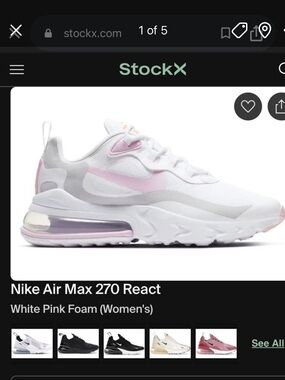 Nike Women’s White Sneakers with Pink Accents and Orange Insole Logo